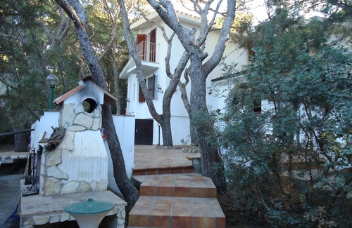 Porto Pino Villa | Confortable villa sur la marina à 20 mètres de la mer avec une grande forêt de pins privée
