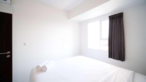 Sidoarjo Appartement | Comfy and Spacey 2BR Apartment at Suncity Residence By Travelio