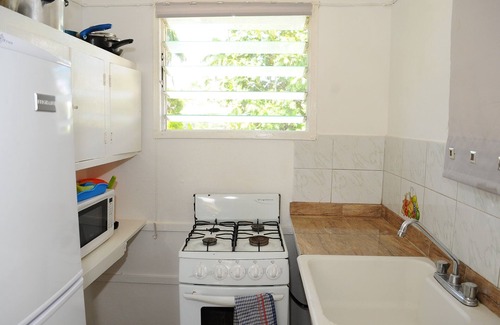 Mammee Bay Estates Appartement | Chambres confortables avec piscine, wifi gratuit, spa, barbecue, sécurité 24h / 24