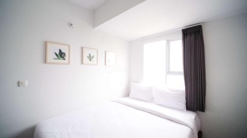 Sidoarjo Appartement | Compact and New 2BR Apartment at Suncity Residence By Travelio
