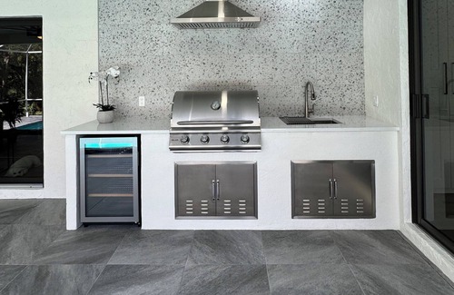 Palm River Estates Maison | Completely renovated 3-bedroom, heated pool home, minutes from Naples beach!