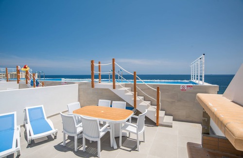 San Tumas Appartement | Appartement contemporain avec vue imprenable sur la mer et piscine privée à débordement