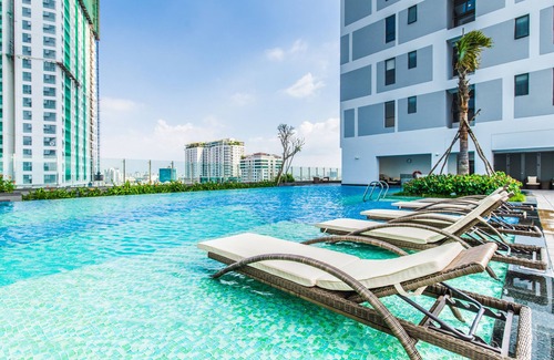 District 4 Copropriété | Corner 1226 - Spacieuse chambre 1BR avec accès à la piscine et au gymnase