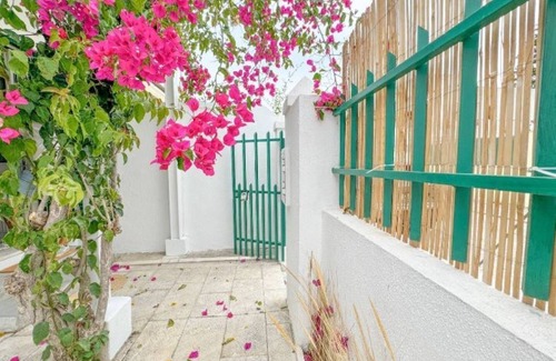 Costa de Caparica Villa | Costa INN | Cozy retreat with pool by the beach by Homeful