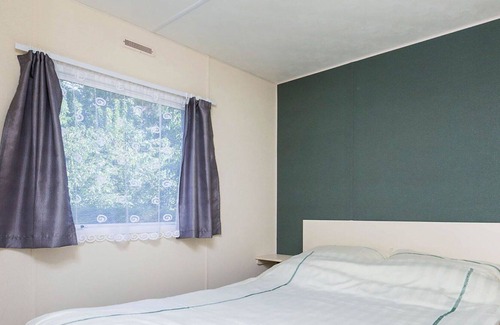 Municipality of Arnhem Maison | Bel appartement dans une maison de vacances avec piscine, WIFI, TV, animaux admis et parking