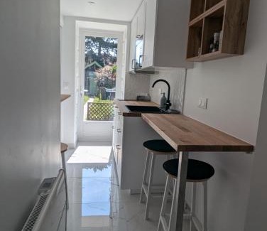Saint-Gratien Appartement | Cosy appartment with access to garden, parking and direct line to Eiffel tower