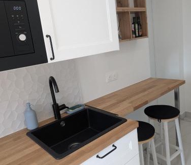 Saint-Gratien Appartement | Cosy appartment with access to garden, parking and direct line to Eiffel tower