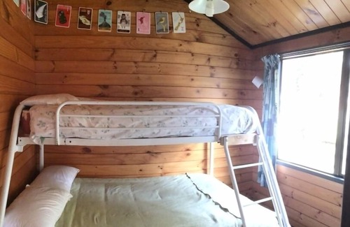 Holdens Bay Maison | Bach confortable, superbe site au bord du lac, emplacement pratique