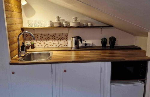 Ryggur Appartement | Cosy big room with minikitchen in charming Miðvágur