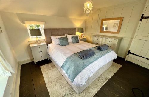 Layer Marney Maison | Cosy Coastal 2-Bedroom Cottage with Hot Tub and Log Burner