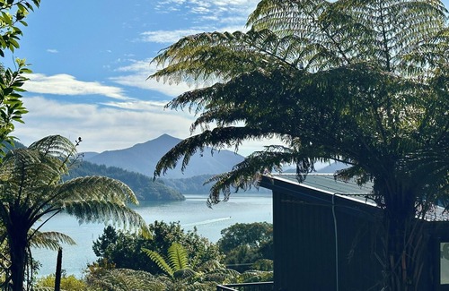 Moetapu Bay Cabine | A cosy two bedroom off-grid cabin, the perfect place to rest, relax & recharge.