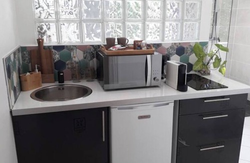 Saint-Louis Appartement | Studio cosy dans grand jardin arboré, terrasse avec jaccuzi