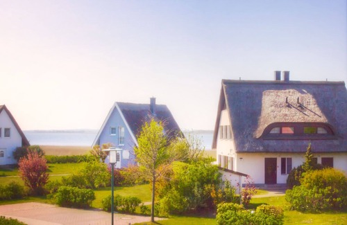 Neuenkirchen Maison | Cottage sur l'eau | 2 chambres à coucher, sauna et cheminée, Wi-Fi Pets willk.