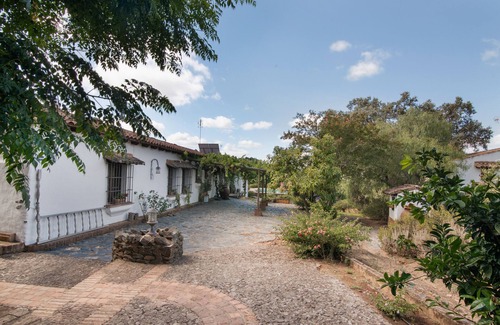 El Campillo Maison | Maison de campagne 'Caldera Vieja' avec vue sur les montagnes, piscine et jardin partagés