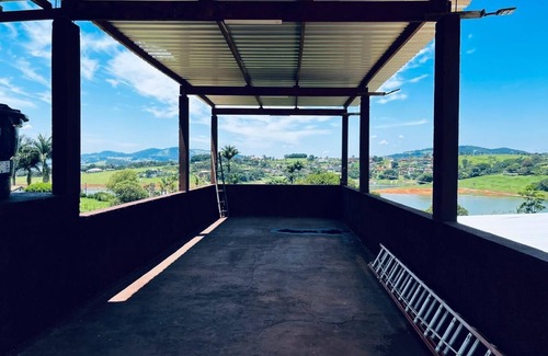 Agua Comprida Maison | Cozy farm in front of the dam, for water sports and fishing.