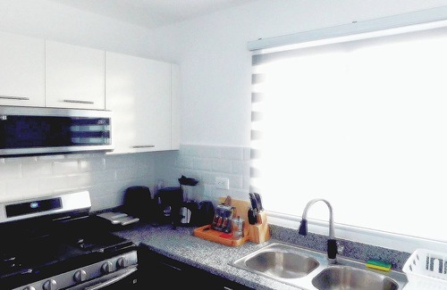 Bella Vista Copropriété | Cozy 1-Bedroom Apt in the Heart Bella Vista, Sto Dgo. ROOFTOP, GYM,POOL.PARKING.