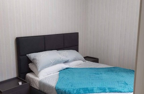 Makati Appartement | Cozy 1-bedroom apartment facing amenities with WiFi in upscale Uptown BGC Taguig
