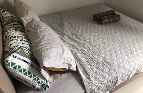 Las Pinas Copropriété | Cozy 1 bedroom by the mall with Netflix