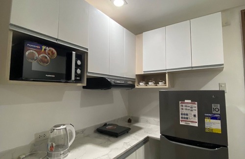 Batangas City Copropriété | Cozy 1-bedroom condo with WiFi and AC in delightful Batangas City