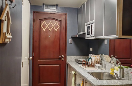 Silang Copropriété | Cozy 1-bedroom condo with AC, WiFi in serene Silang Kitchen mini karaoke.