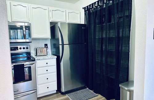 South Salt Lake Copropriété | Cozy 2-bedroom condo with AC, nestled in South Salt Lake City.