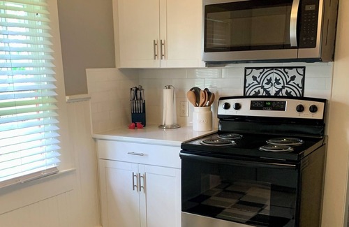 Kyle Cottage | Cozy 2 BR Cottage with Inviting Sunroom, Spacious Yard and Ultimate Comfort