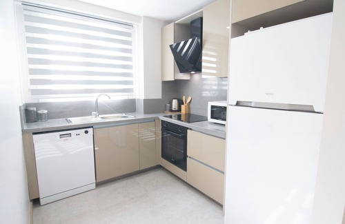 Uludag Appartement | Cozy 2BR Apt Near Vialand Mall with Nespresso