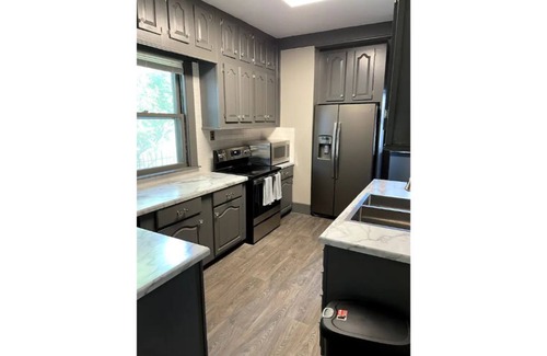 Medical Center Maison | Cozy 4-bedroom home walking distance to Blackstone