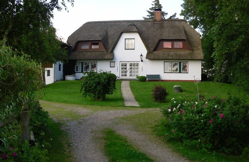 Poppenbull Appartement | appartement confortable dans une maison au toit de chaume dans une idylle rurale