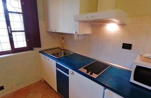 Mulazzo Appartement | Cozy apartment in small hamlet, with pool and views of the Apuan Alps