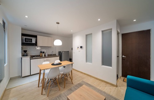 Financial District Appartement | Cozy Apartment in Zona G with Laundry Facilities