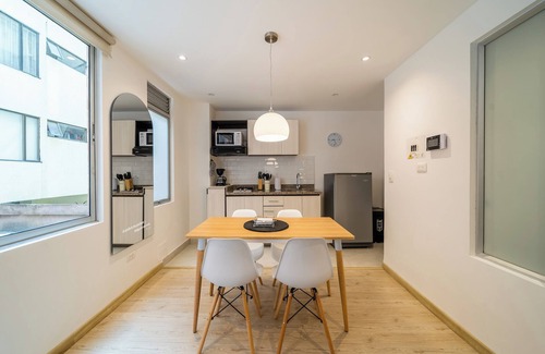 Financial District Appartement | Cozy Apartment in Zona G with Laundry Facilities