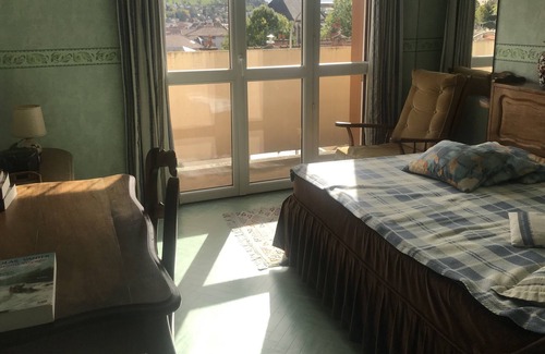 Aurillac Appartement | Cozy apartment near the historic city center with a view.