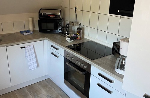 Coppenbrugge Appartement | Cozy attic apartment with fireplace on the Ith