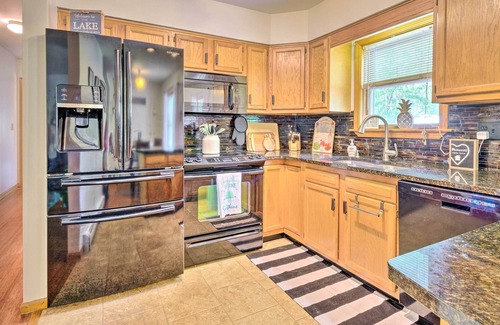 Auburn Cottage | NEW! Cozy Auburn Retreat w/ Hot Tub - Walk to Lake
