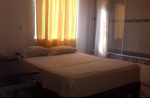 Florida Nueva Hôtel | Cozy bedroom in charming Medellín with WiFi