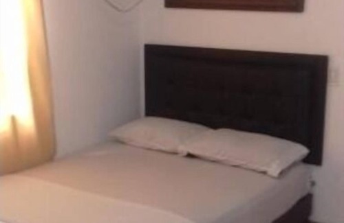 Florida Nueva Hôtel | Cozy bedroom in charming Medellín with WiFi