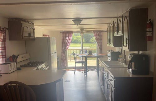 Gladwin Maison | Cozy bungalow bring your off road vehicle and snowmobiles.