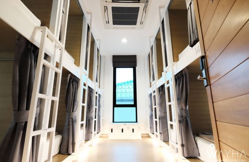 Lak Si Hôtel | Cozy Capsule Dorms With a Shared Kitchen and a Social Area