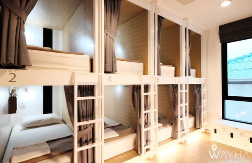 Lak Si Hôtel | Cozy Capsule Dorms With a Shared Kitchen and a Social Area