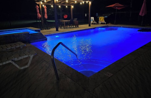 West Livingston Cottage | Cozy cottage near the lake with private pool and hot tub. Dog-Friendly!
