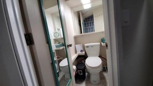 Aloha Appartement | Cozy Cottages across from the Food Trucks of Aloha mall