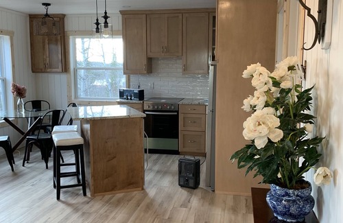 Manitoba Maison | Cozy Guest cottage waterfront with screened in gazebo