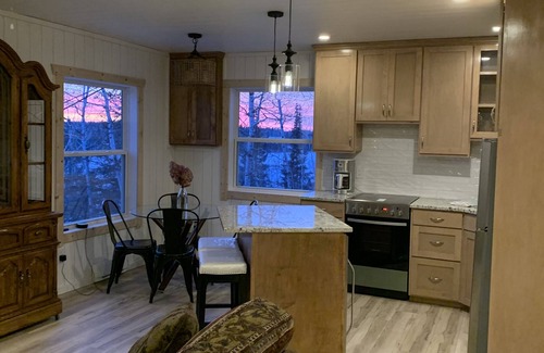 Manitoba Maison | Cozy Guest cottage waterfront with screened in gazebo