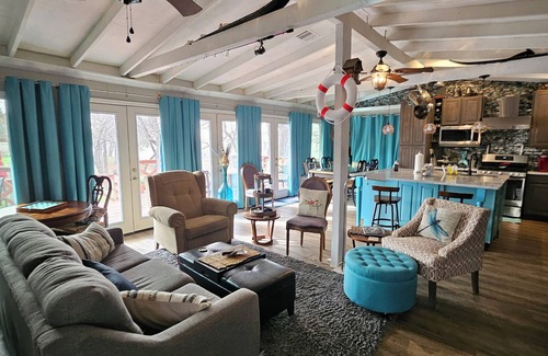 Little Elm Maison | Cozy lake front cottage on Lake Lewisville. Enjoy the kayaks, firepit & sunsets.