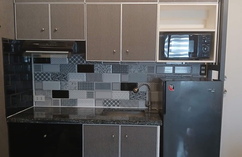 Highway Hills Copropriété | Une chambre confortable à l'avant-garde