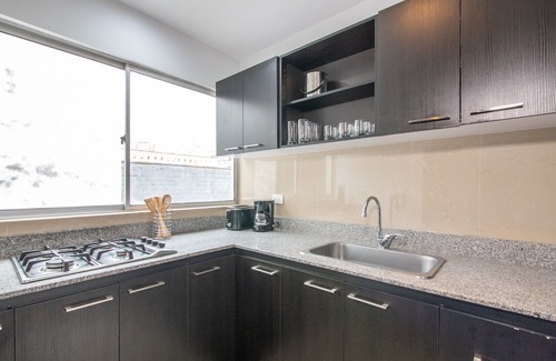 Astorga Appartement | Cozy Penthouse next to Poblado Park with Large Balcony and A/C
