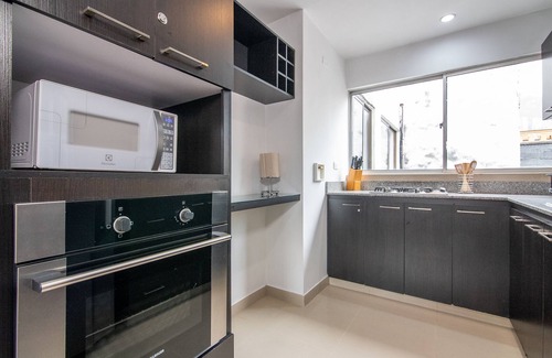 Astorga Appartement | Cozy Penthouse next to Poblado Park with Large Balcony and A/C
