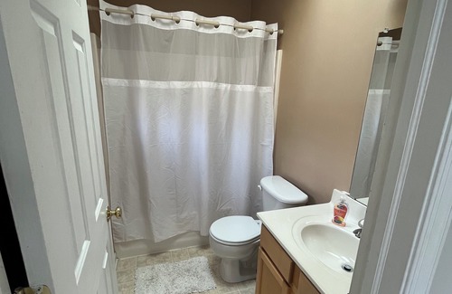 Blooming Glen Maison | Cozy private room with full bathroom , use of shared kitchen and living room.