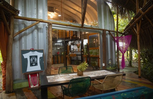 Jaco Maison | Cozy tropical / industrial quonset located in a secondary tropical forest.
